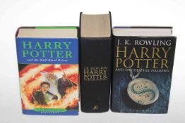 Three first edition Harry Potter books.