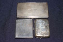Three silver cigarette cases, two engine-turned Birmingham 1932 and 1950, one engraved London 1914.