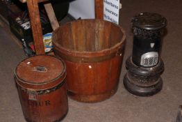 Vintage flour bin, half barrel planter and a vintage Valor heater.