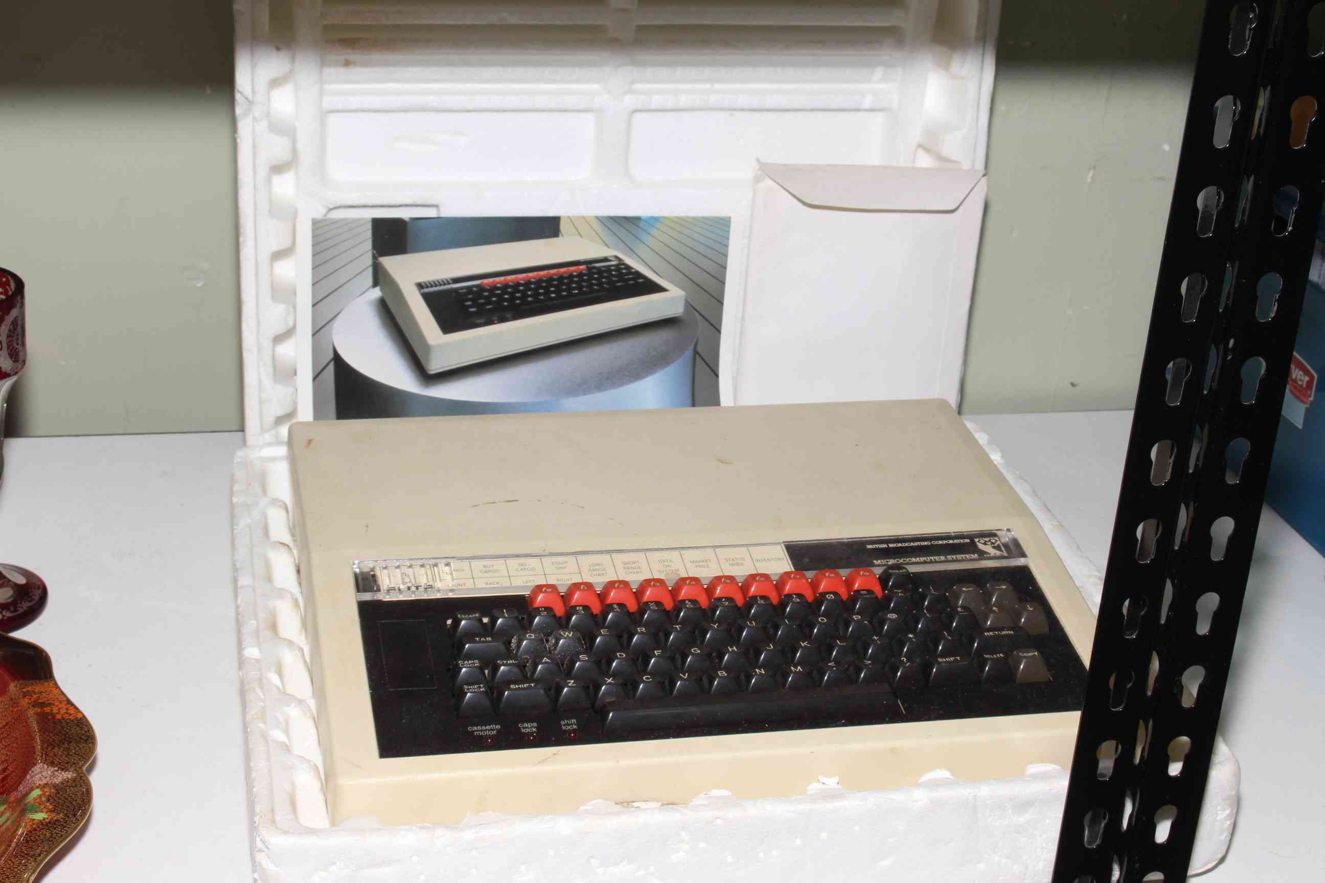 BBC Microcomputer system with paperwork, dated 1984.