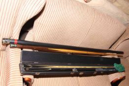 BCE Ronnie O'Sullivan cased snooker cue and two piece cue and case.