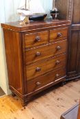 Victorian mahogany chest of two short above three long drawers on turned legs, 122.