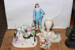 Four Continental porcelain figures including a young Napoleon with crest 28cm high, maiden vase,