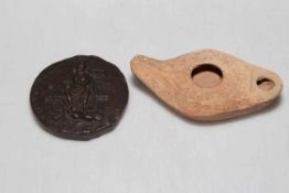 Late Roman terracotta oil lamp and replica seal paperweight (2).