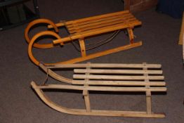 Two vintage wooden sledges.