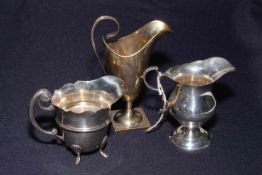 Collection of three silver cream jugs, Chester 1926, and Birmingham 1910 and 1919.