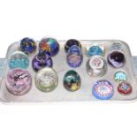 Collection of sixteen glass paperweights including Millefiori.