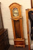 Bentima double weight longcase clock having arched dial.