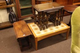 Rectangular tiled top coffee table, nest of three oak tables and small low oak gate leg table (3).