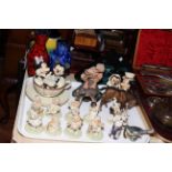 Collection of eleven Disney Showcase figures, shelf stand, Poole dolphin, vases, inlaid boxes, etc.