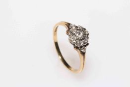 Diamond nine stone 18 carat gold cluster ring, size S/T.