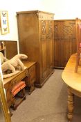 Three piece oak linen fold panel bedroom suite and similar dressing stool.