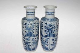 Pair Chinese blue and white vases decorated with panels of foliage, 20cm.