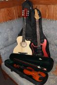 Acoustic and electric guitars with cases, cased violin and bow.