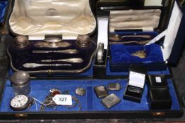 Collection of silver small items including silver gilt book form watch, three vesta cases,