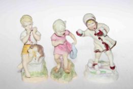 Three Royal Worcester figurines including December, June and March.