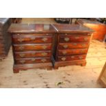 Pair Georgian style Bachelors chests having brush slides above four drawers on bracket feet,