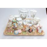 Twelve Beatrix Potter figures including Beswick, Wedgwood Chinese Legend and Kutani Crane vases,