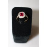 18 carat gold and platinum synthetic ruby and diamond ring, size M/N.