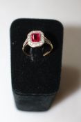 18 carat gold and platinum synthetic ruby and diamond ring, size M/N.