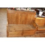 Carved pine box seat hall bench, 120cm by 136cm by 46cm.