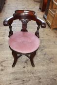 Late Victorian mahogany circular seated elbow chair.