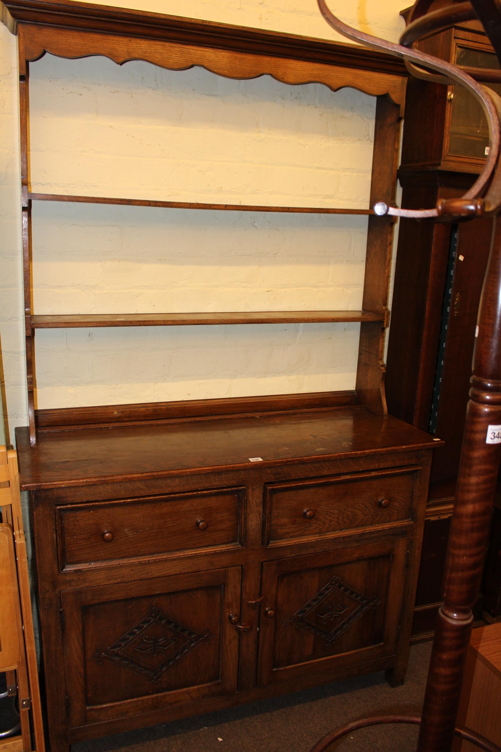 Oak dresser and open rack, 191cm by 117cm by 44cm.
