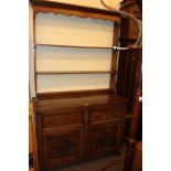 Oak dresser and open rack, 191cm by 117cm by 44cm.