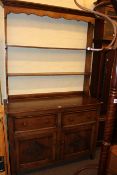 Oak dresser and open rack, 191cm by 117cm by 44cm.