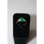 Emerald and diamond 18 carat gold ring,