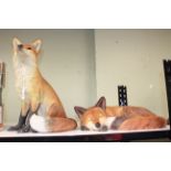 Two large fox models, one by Border Fine Arts.