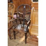 Antique Windsor pierced splat back elbow chair with crinoline stretcher.