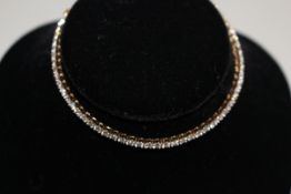 18 carat gold and diamond tennis bracelet, having approximately 2.5 carat total diamonds, 17.
