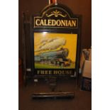 Arched top wall mounted pub sign 'Caledonian', 144cm.