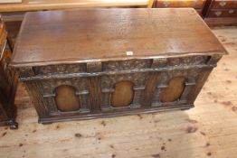 Carved oak triple arched panel front coffer, 63cm by 117cm by 49cm.
