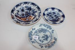 Three antique blue and white Delft plates.