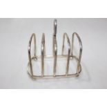 Silver five bar toast rack, London 1931.