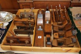 Collection of fifteen wood smoothing and moulding planes.