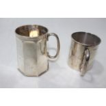 Two silver christening mugs, Sheffield 1904, and Birmingham 1908.