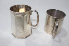 Two silver christening mugs, Sheffield 1904, and Birmingham 1908.