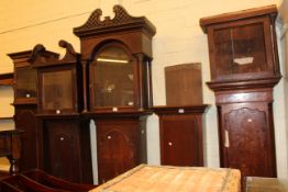 Collection of five antique longcase clock cases.