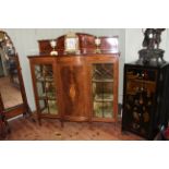 Edwardian mahogany and satinwood inlaid bow front centre three door vitrine, 150cm by 137cm by 39cm.