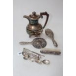 Embossed silver brushes and mirror, silver spoons, EP jug, etc.