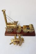 Brass model of Stephenson's Rocket, 30cm long, and small model of Titanic sextant (2).