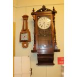 Victorian inlaid walnut wall clock and 1930's barometer.