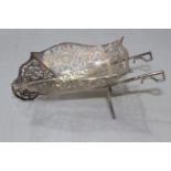 Silver wheelbarrow novelty bon bon basket, having pierced and engraved decoration, Birmingham c1910,