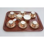 Set of six Royal Crown Derby Imari pattern coffee cans and saucers,