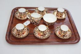 Set of six Royal Crown Derby Imari pattern coffee cans and saucers,