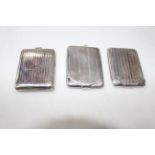 Collection of three silver match book holders, Birmingham 1924, 1929 and 1936.