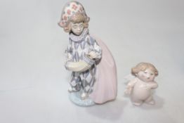 Lladro Young Clown with Concertina, sculptor Jose Pache, retired, 8cm, and Nao Singing Cherub (2).
